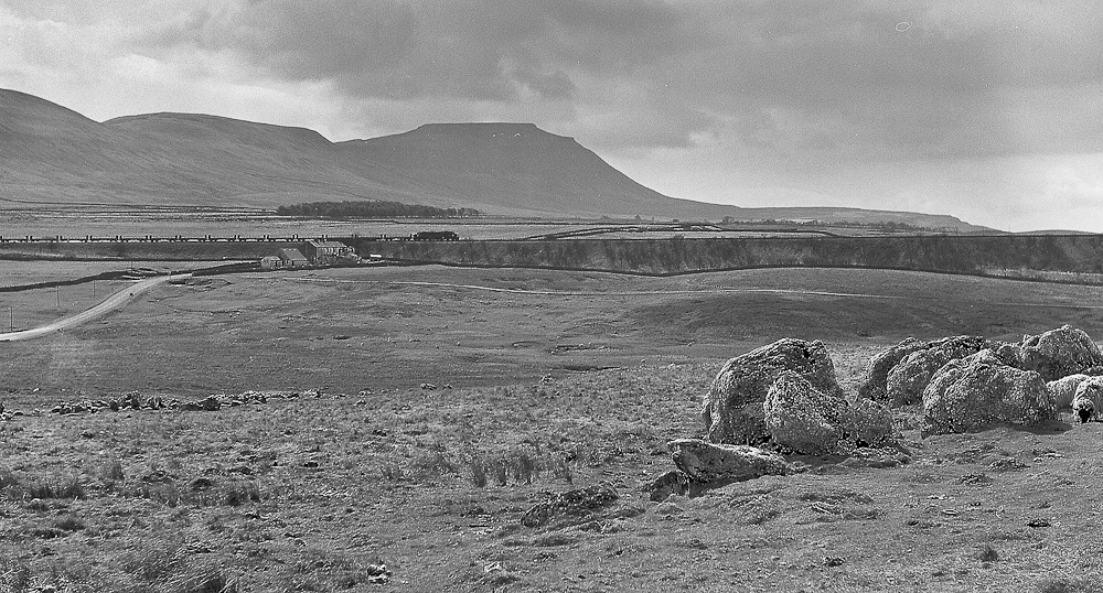 Ribblehead 1973
244 heading north at Ribblehead. 244 disgraced itself by expiring about one mile further on and causing a blockage that lasted a good while and ruined my afternoon!
Keywords: Ribblehead