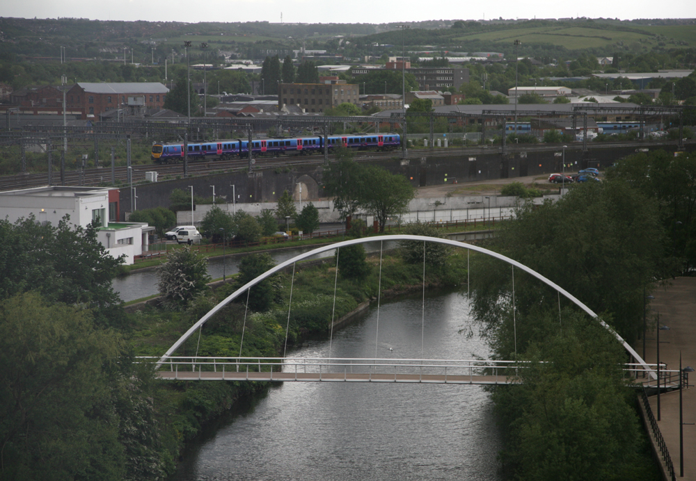 TPE 185 appraching Leeds
Taken through smoked glass office windows overlooking the Aire during heavy rain
Keywords: TPE 185 Leeds River Aire