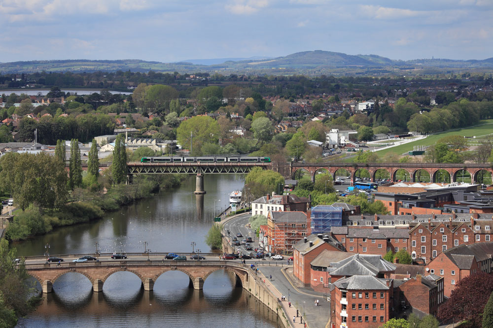 Crossing the Severn
A London Midland class 170 crosses the River Severn at Worcester with a Birmingham to Hereford service. Seen from the tower of Worcester Cathederal.
