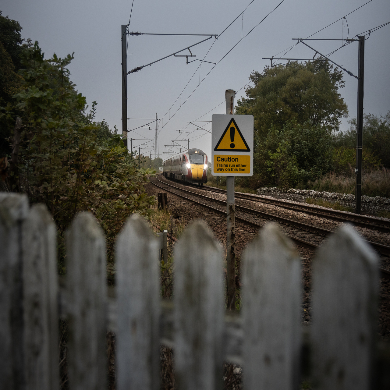 Cautioned
Approaching Beal Crossing on the road to Holy Island from the A1, a view no doubt glanced by thousands as they head toward Lindisfarne. 801229 with LNER 17:00 Edinburgh to Kings Cross. I tried to compose using the masts as a frame with the fence as the foreground, but there was no option but to use the sign as a feature.
